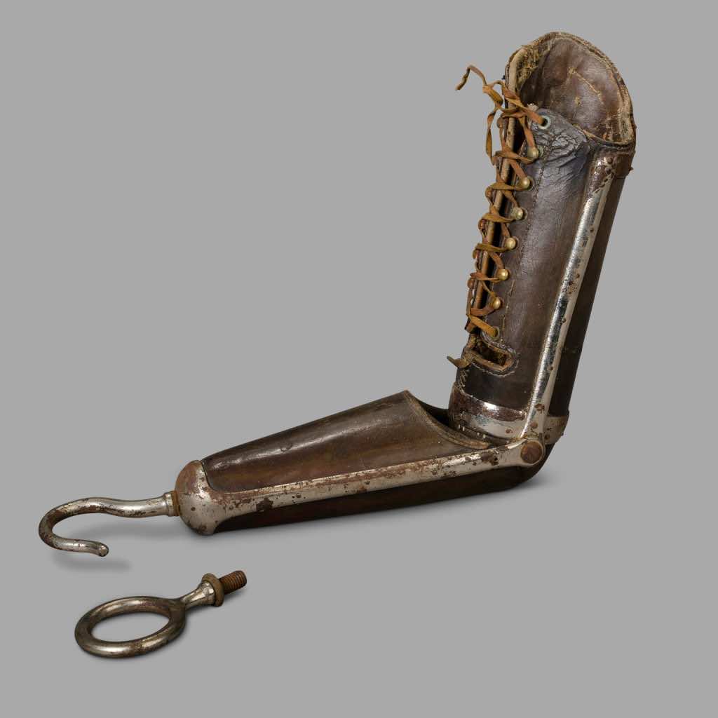 Leather prosthetic arm with hook and ring, c. 1920
