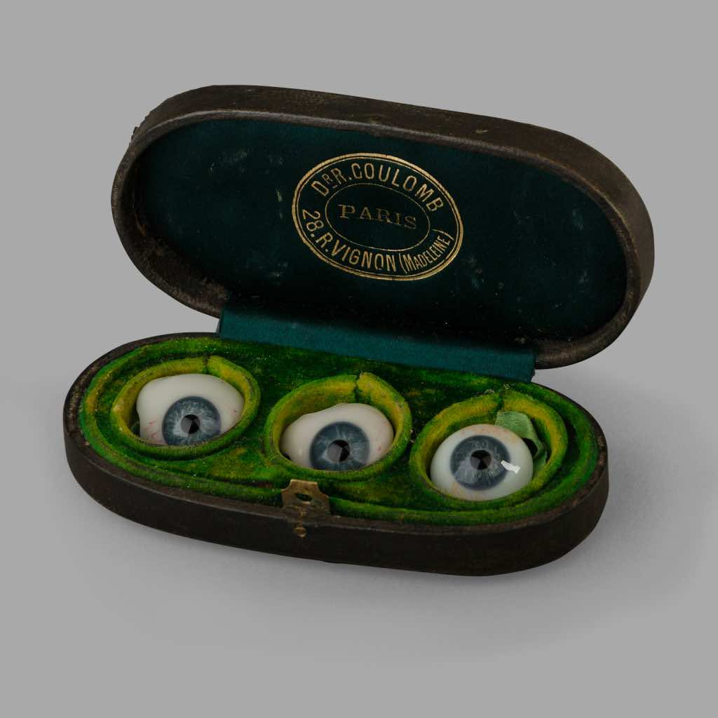 Three Glass Eyes in Their Storage Box